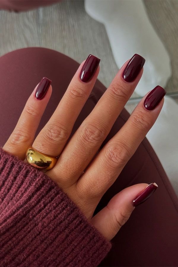 French tips on almond-shaped nails in a soft pink tone