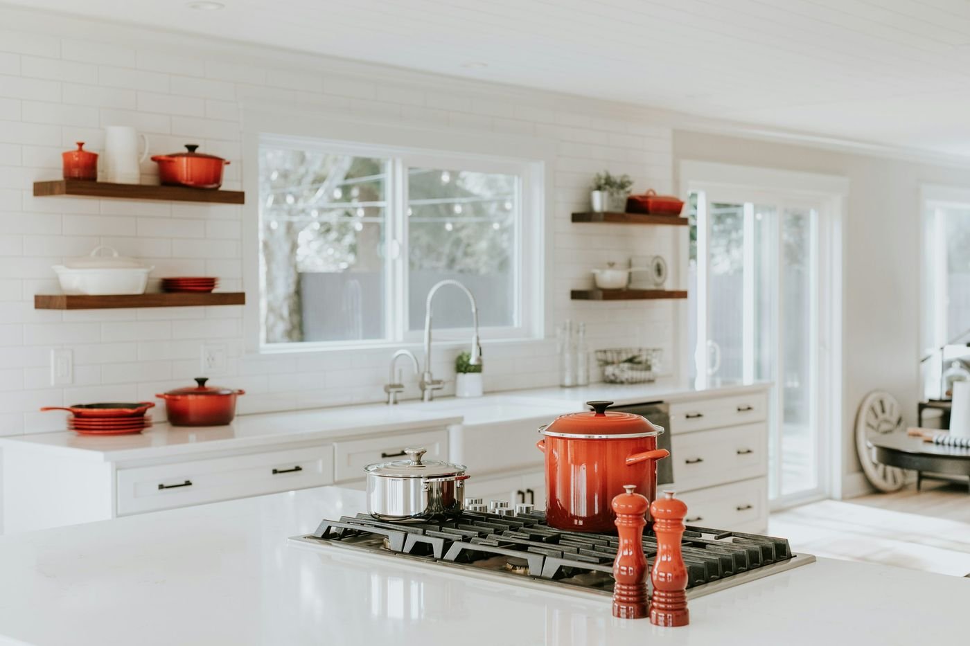 Kitchen countertop accessories arranged in neutral tones