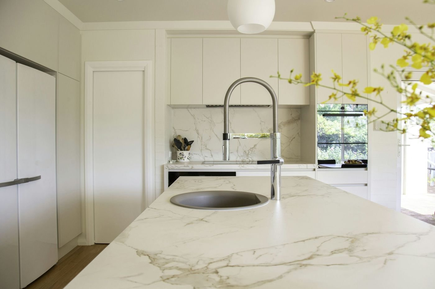 Kitchen countertop styling with functional accessories and natural materials