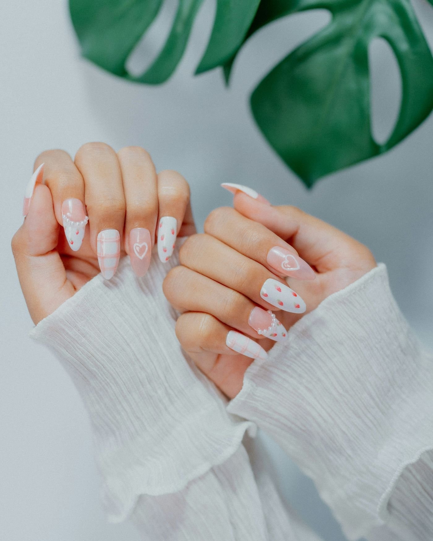Professional manicure being applied in a salon setting