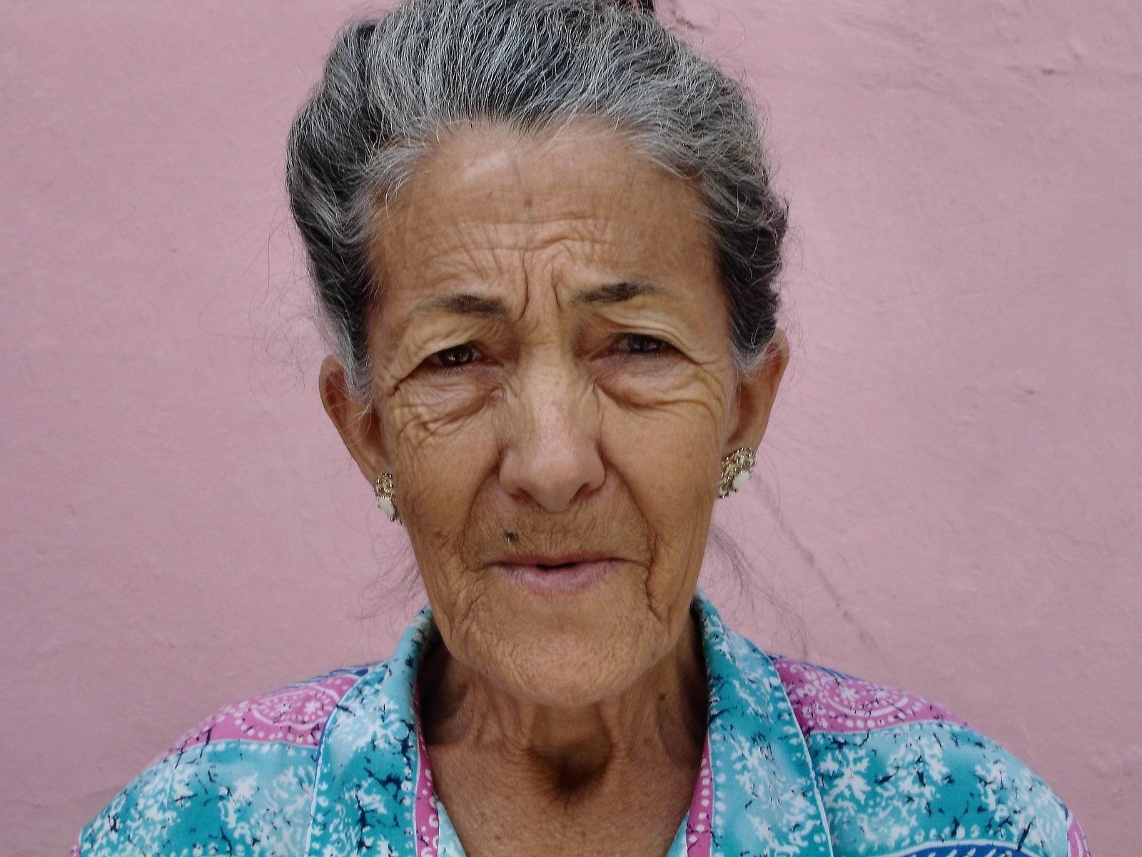 Elderly woman in her 70s with a candid natural portrait