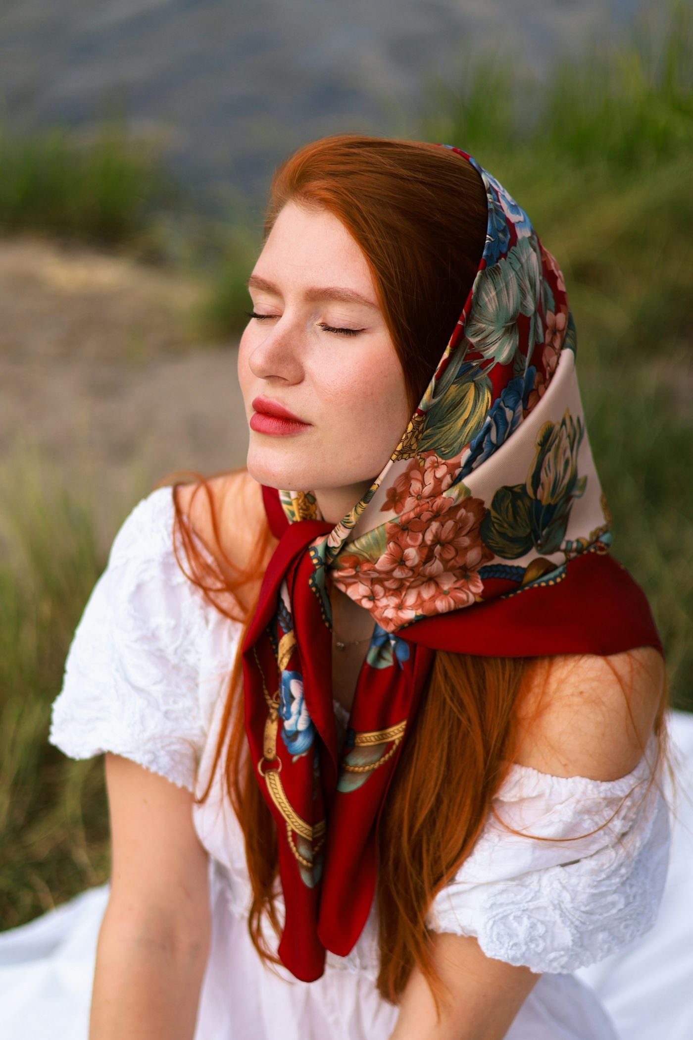 Styling guide showing a silk scarf worn at the neck, as a belt, and on a bag handle