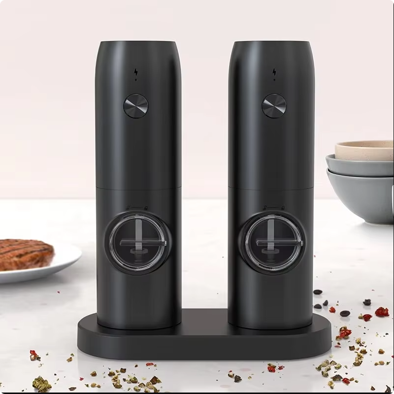 electric salt and pepper grinder set — cozy home essentials kitchen upgrade over plated dish